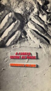 CABEÇA ENTRE AS MAOS